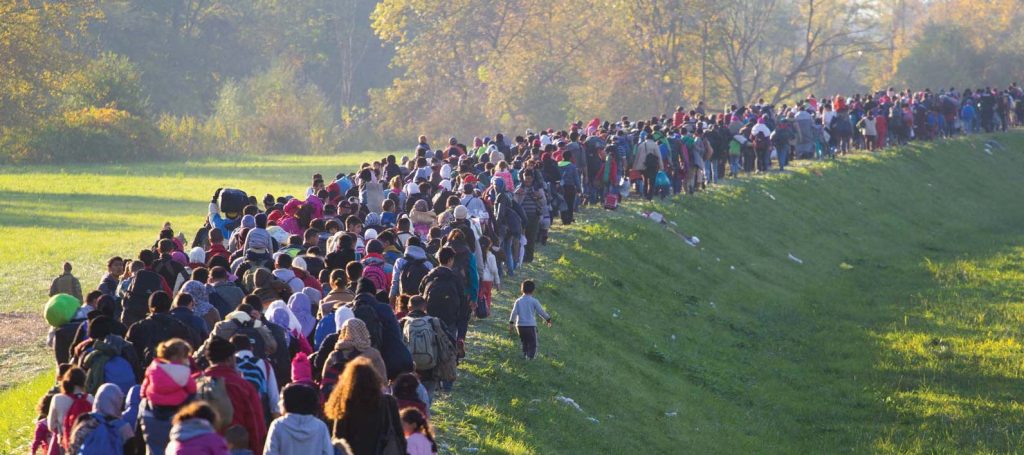 Image of a crowd of refugees on the move.