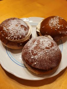 The laskiaispulla (almond, raspberry, and chocolate raspberry).